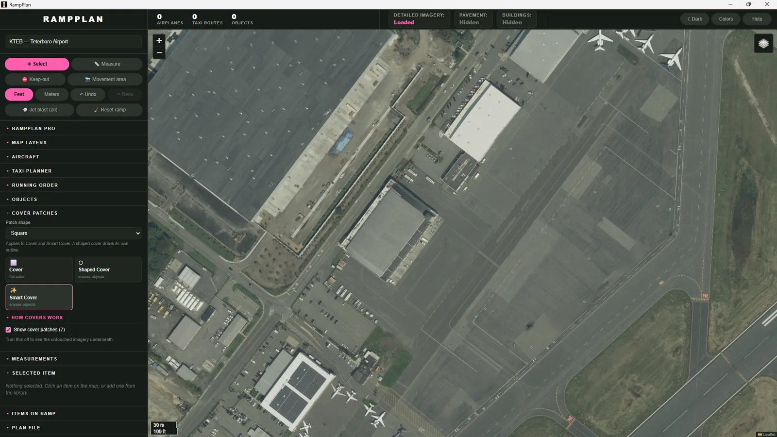 After: the same ramp with the parked aircraft removed and the painted markings intact.